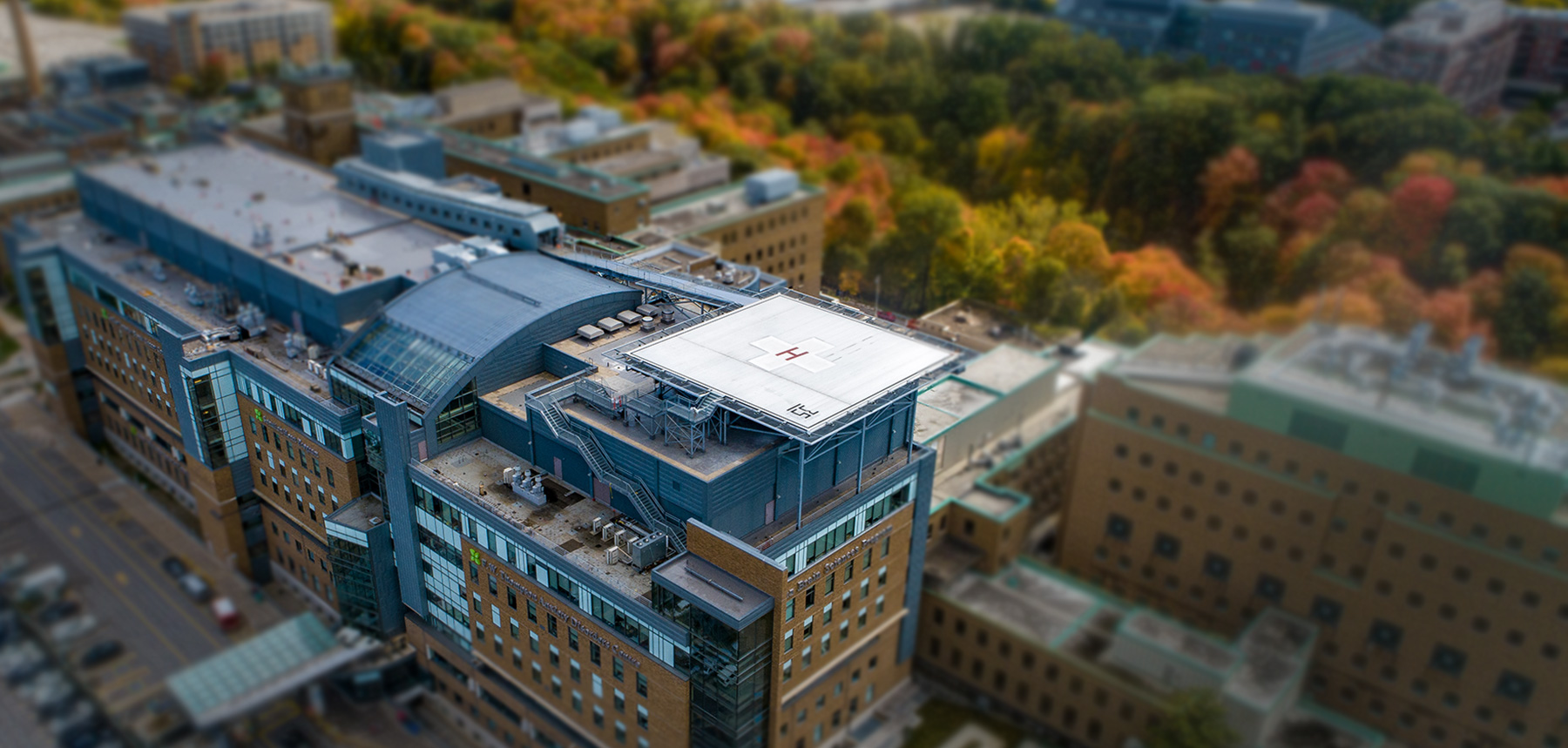 picture of the ariel view of a hospital and helicopter pad